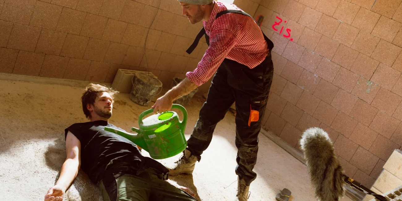 Behind-the-scenes shot showing Austrian Kiwi and Holy Moly films director Hannes Kirschner testing a scene during a comedy sketch production.